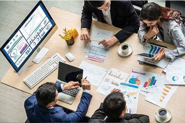Business data dashboard analysis by ingenious computer software . Investment application display business sales and profit on the computer screen