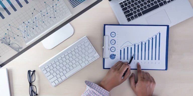 analyzing the work Accounting on Laptop investment concept.