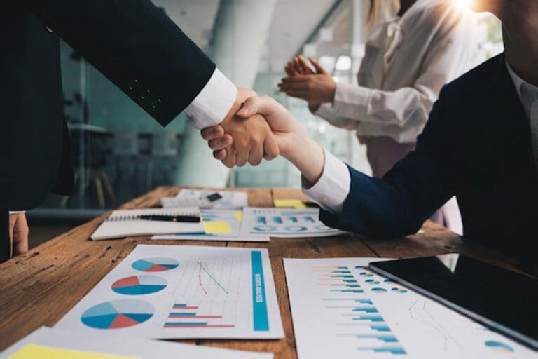 Business people shaking hands, finishing up meeting, business etiquette, congratulation, merger and acquisition concept