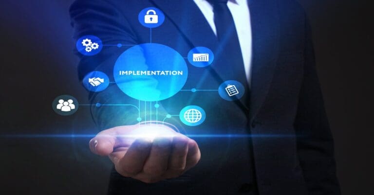 Business, Technology, Internet and network concept. Young businessman working on a virtual screen of the future and sees the inscription: Implementation