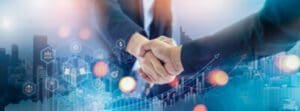 Businessman handshake for teamwork of business merger and acquisition,successful negotiate,hand shake,two businessman shake hand with partner to celebration partnership and business deal concept