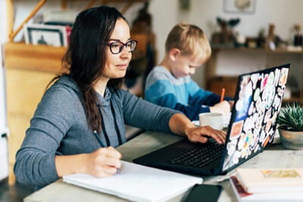 Mom and son working from home